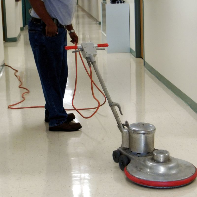 Commercial floor waxing to restore shine and protect hard floors
