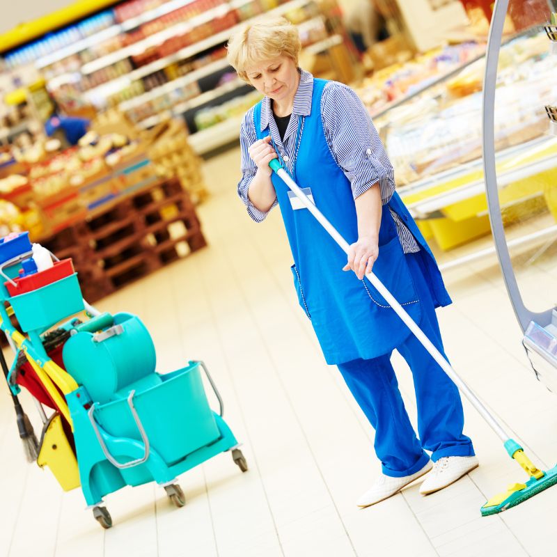 Commercial cleaning team maintaining a clean retail store
