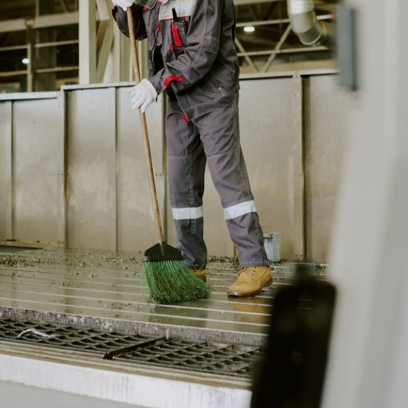 Industrial cleaning team maintaining a manufacturing facility